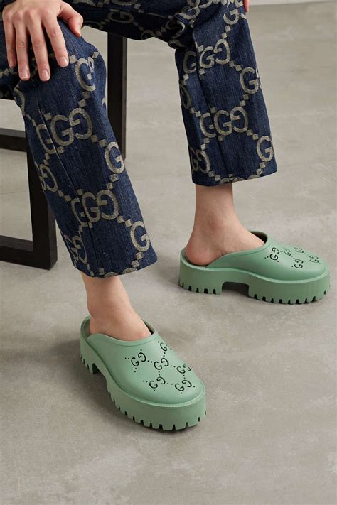 gucci perforated platform mules.